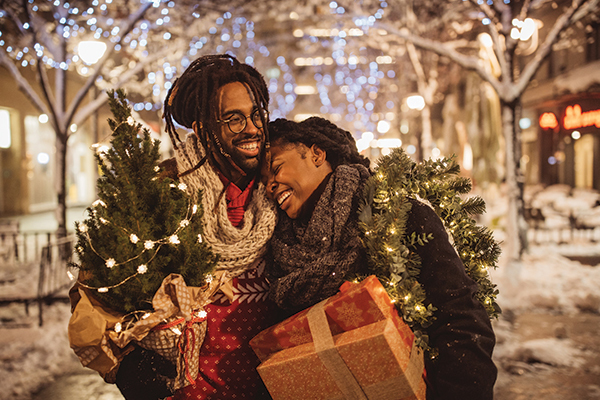 Couple with Christmas tree