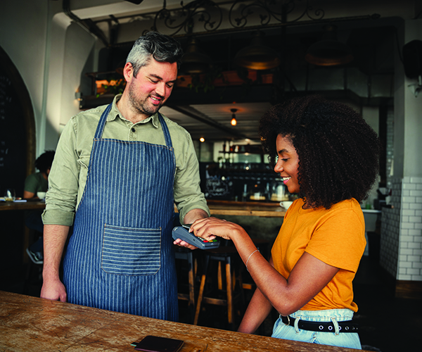 Two people engaging in a transaction