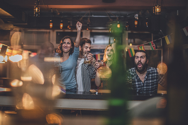 Fans at a bar