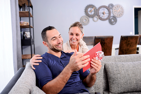 couple reading a card