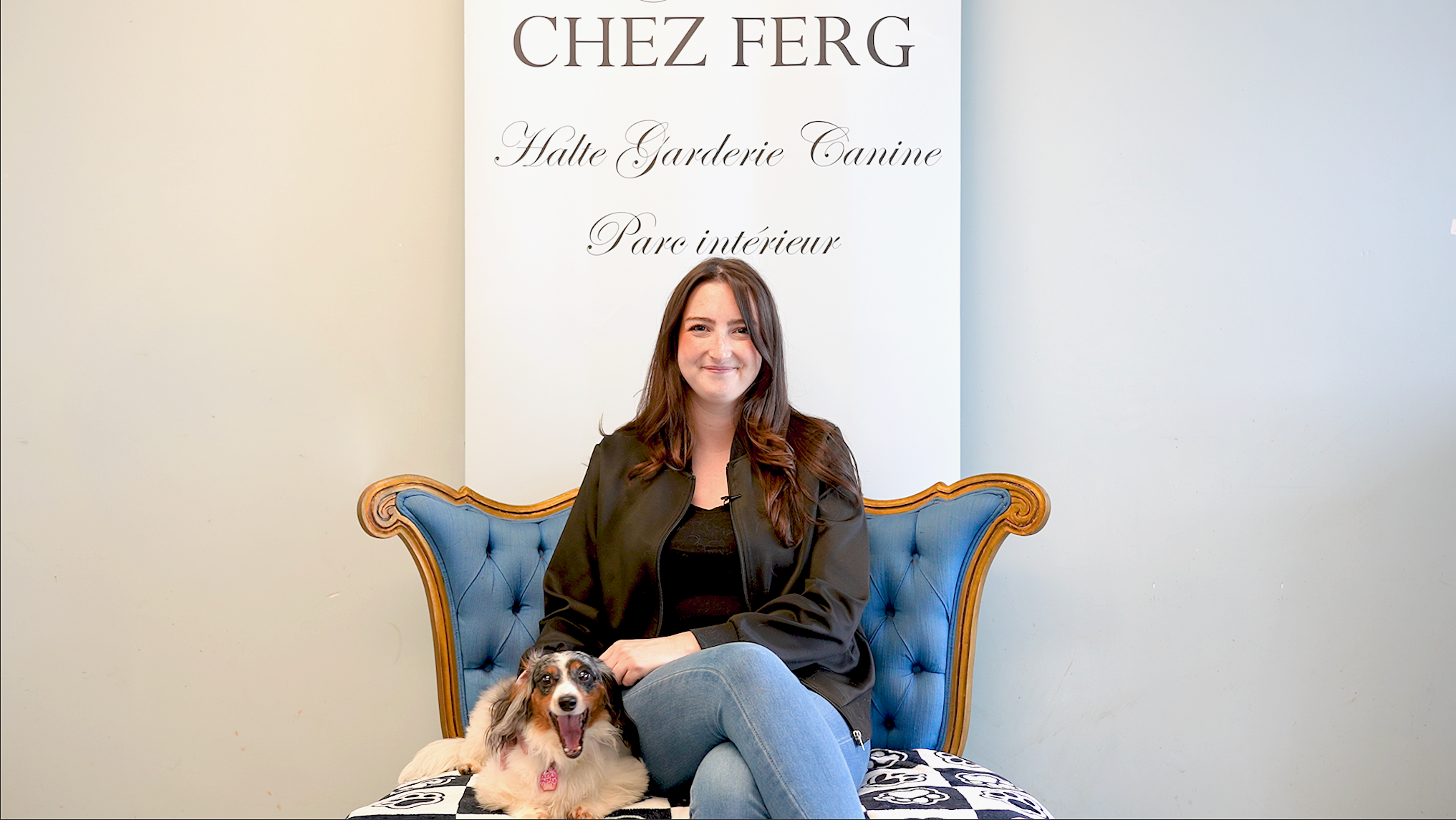 woman sitting with a dog