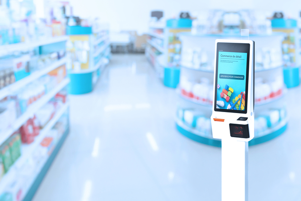 Borne libre-service Moneris Go Détail dans une pharmacie.