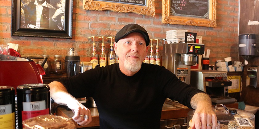 Owner in coffee shop