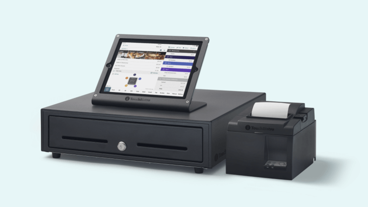 TouchBistro point-of-sale system with cash drawer and receipt printer integrated with Moneris for seamless restaurant payment processing.